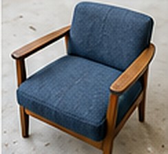 張り替え後:藍色の織物を張った一人掛けソファ